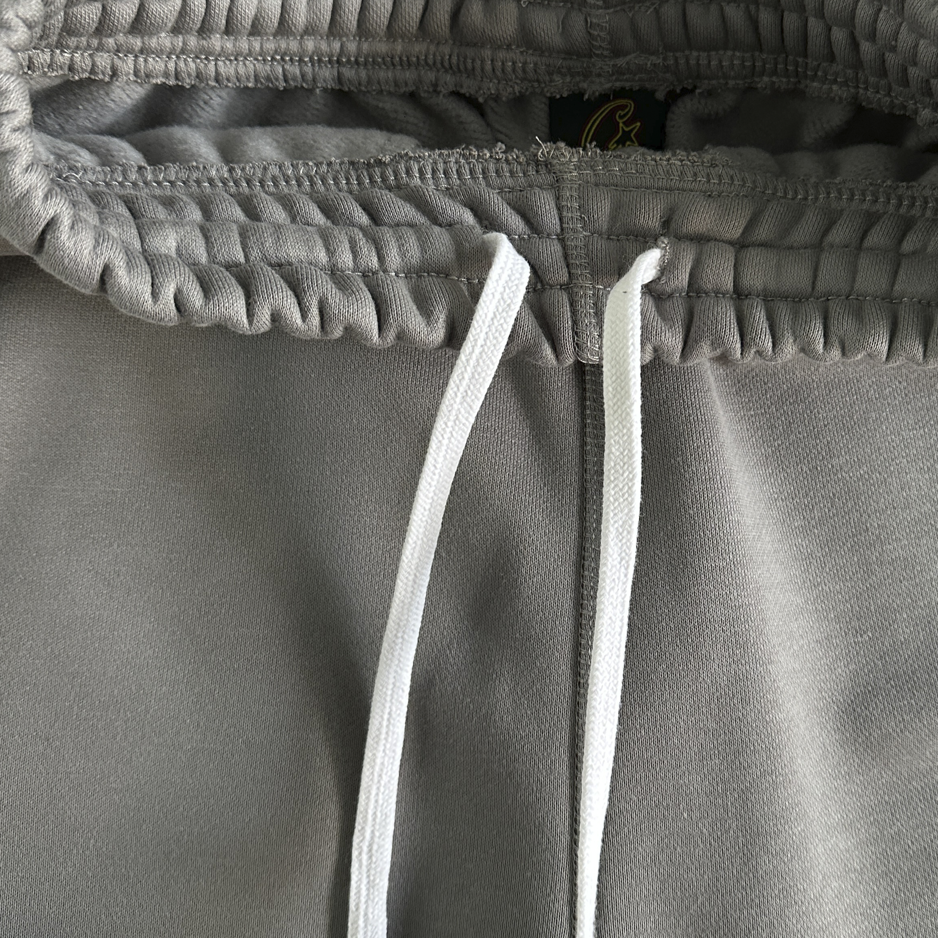 ISLAND PUFF PRINT ZIP PANTS (GREY)